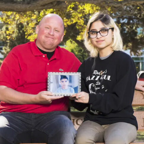 Steve saved Michael's life through donation. Donor sister, Jennifer, and Michael hold his picture.