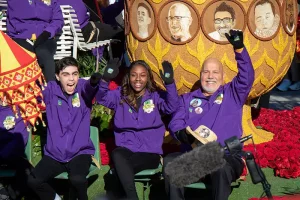 Khalieghya Dandie-Evans (middle) cheers on the 2020 Donate Life Rose Parade Float